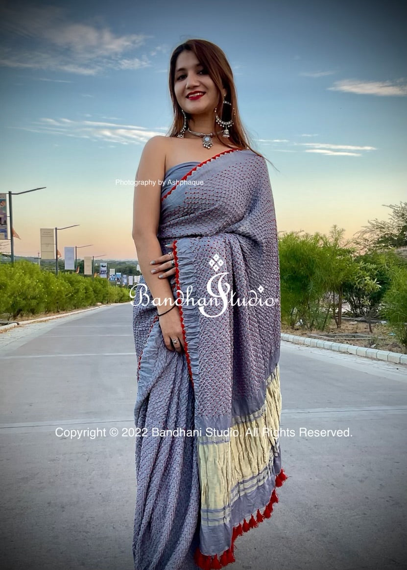 Red Bandhani dots in pastel gray color shade