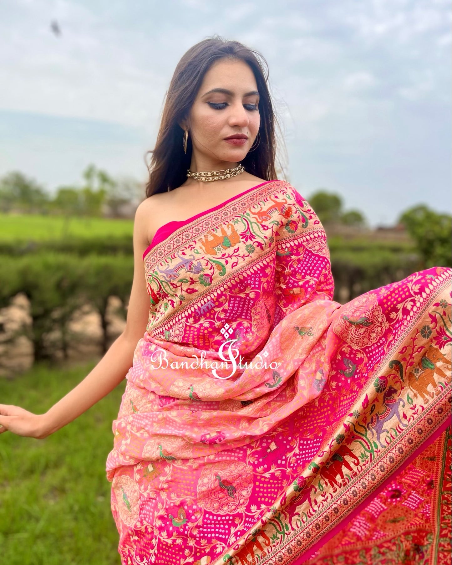 Pink and Peach Shikargah Bandhani Saree