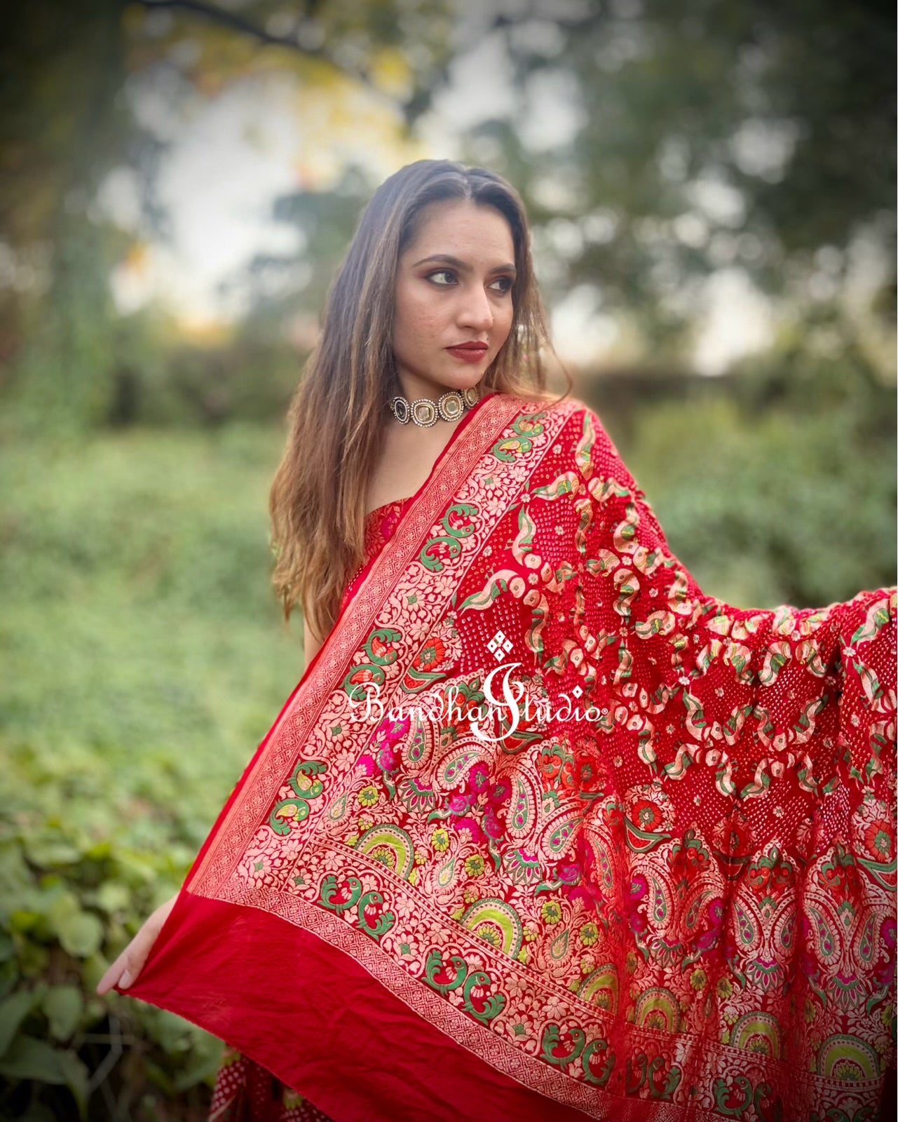 Red Parrot Motifs Bandhani Meenakari Lehenga