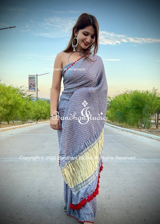 Red Bandhani dots in pastel gray color shade